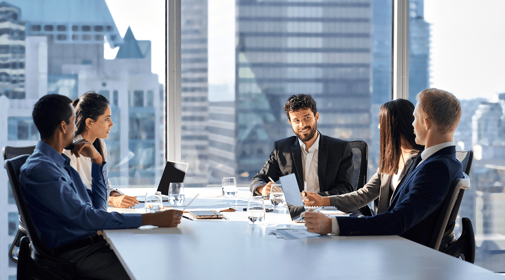Team discussing around a table
