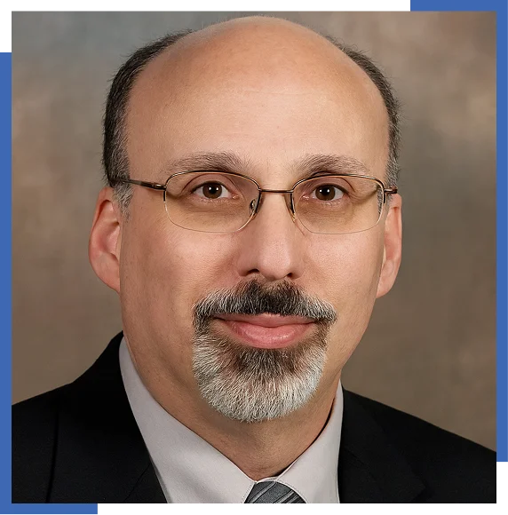 Professional portrait of a man in suit