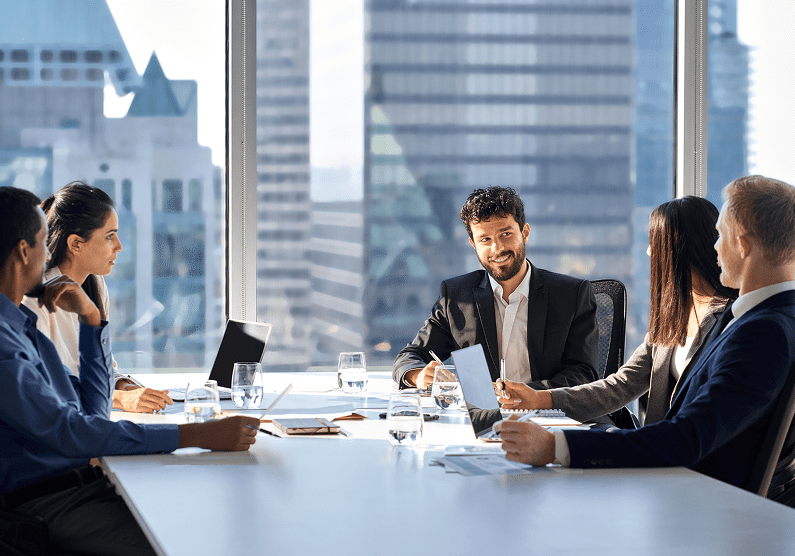 Team discussing around a table